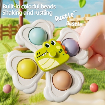 Suction cup rotating bath toy for toddlers
